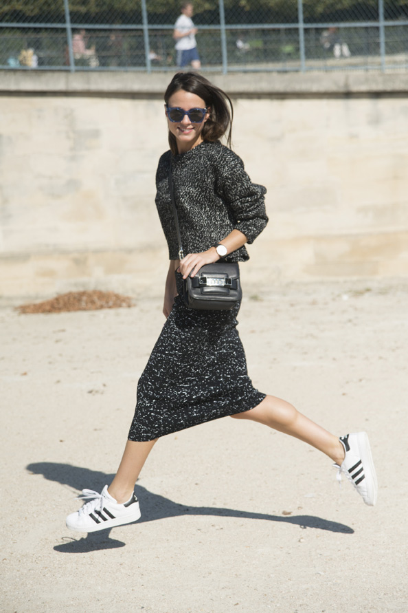 Fashion Buyer and Blogger Zina Charkoplia is wears a Proenza Schouler bag, top and skirt, Adidas trainers and Marc Jacobs sunglasses.