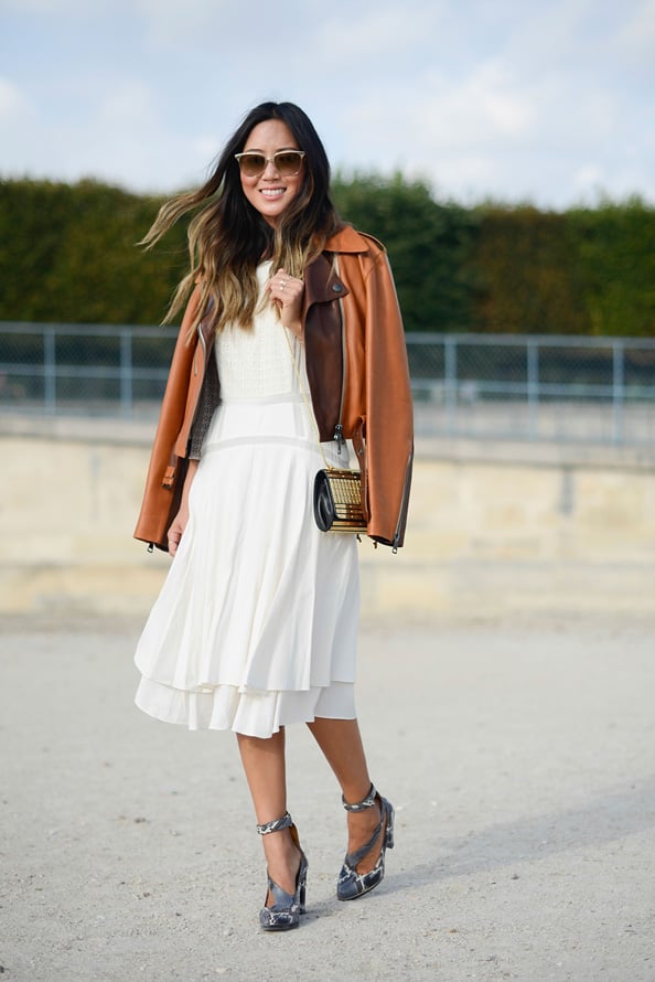 Fashion blogger Aimee Song wears a Chloe jacket and shoes, Rebecca Taylor dress and Elie Saab bag.