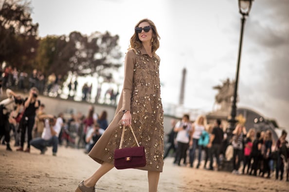 Chiara Ferragni is wearing a dress from Rochas a bag from Chanel sunglasses from Dsquared and shoes from Stella McCartney.