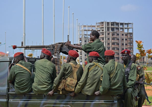South Sudanese soldiers secure a road near Juba's airport 