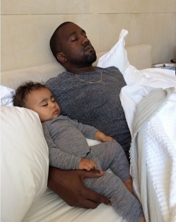 Coud they be more adorable? Kanye West sleeps with baby North West