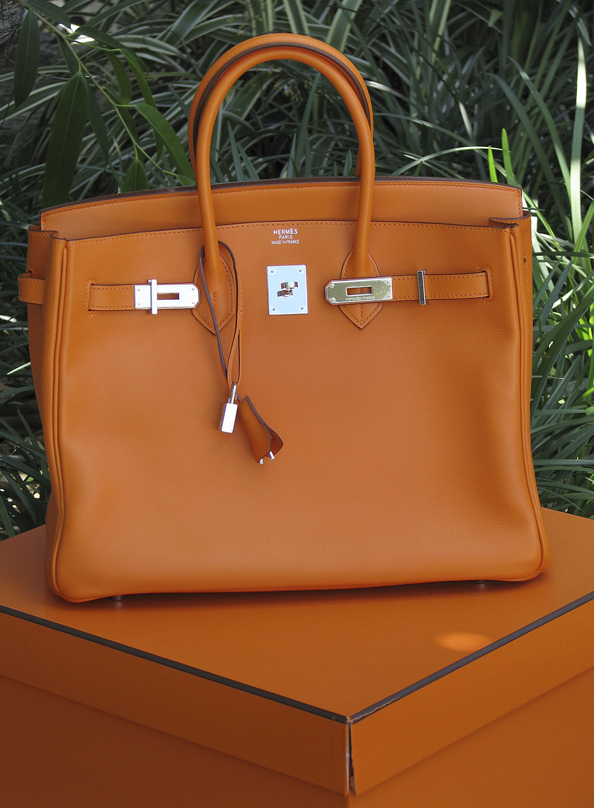 The uber-exclusive Birkin Hermes handbag in Boite Orange. 