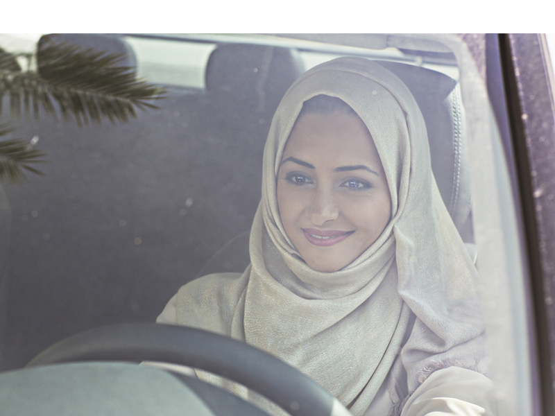 Emirati woman driving a car, women drivers, dubai roads