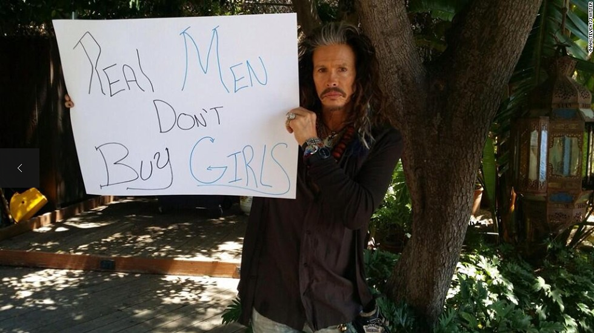 Steve Tyler with the hashtag #RealMenDontBuyGirls.