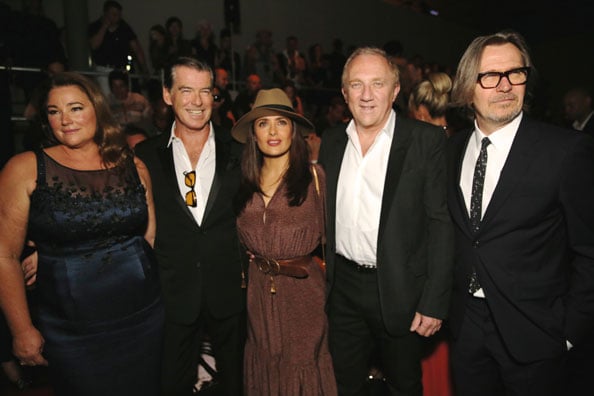 Proud parents: Pierce and Keely Brosnan with Salma Hayek, her husband Henri Pinault and Gary Oldman at the Saint Laurent show