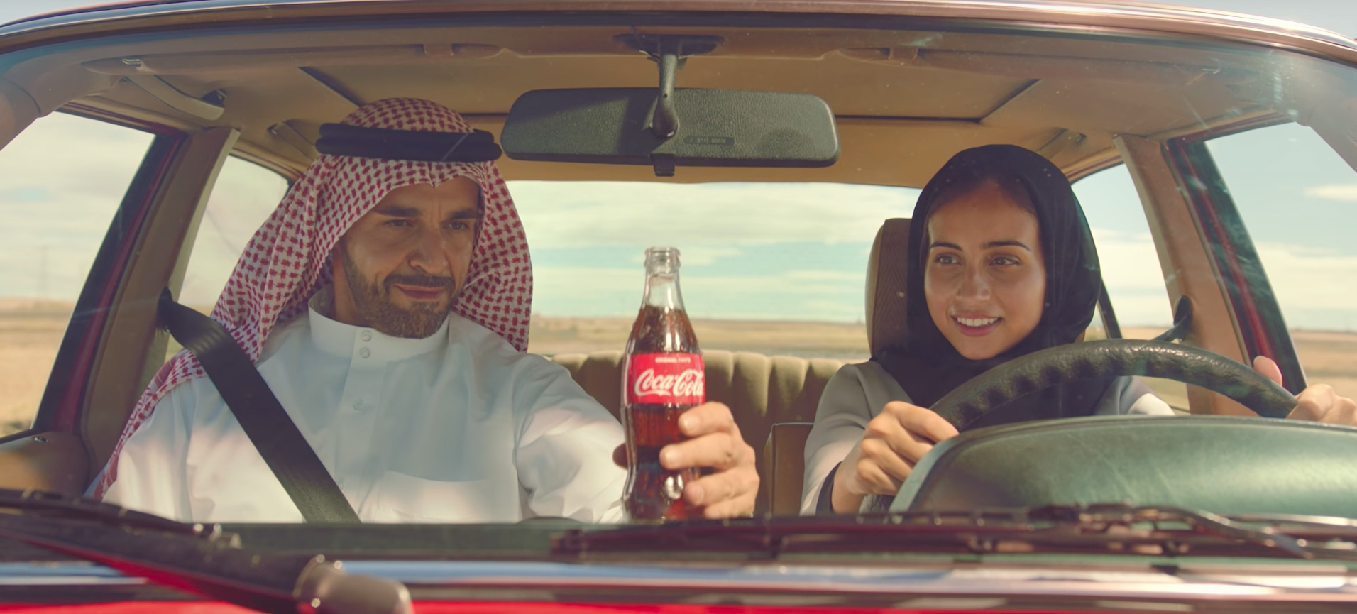 Coca Cola's new ad shows a Saudi woman learning to drive.