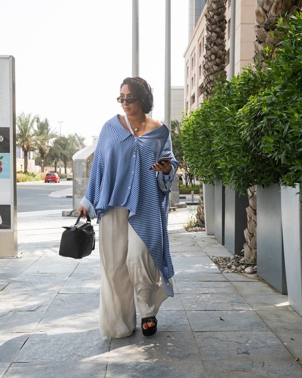 Emirates Woman editor wearing office workwear dubai middle east